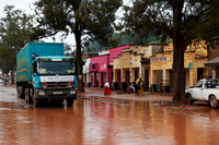 flooded road and coloured houses in Kabale