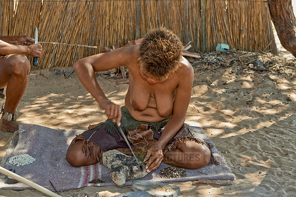 Bushmen preparing handicraft