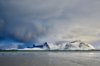 winter landscape with sea and mountains at Sandbotnen, Lofoten
