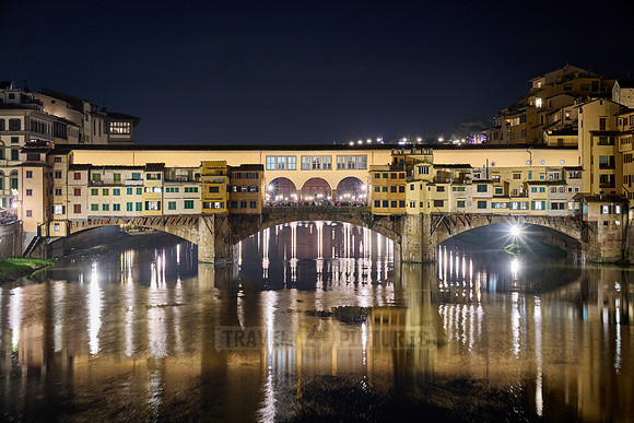 night shot of illuminated medieval brigde Ponte Vecchio