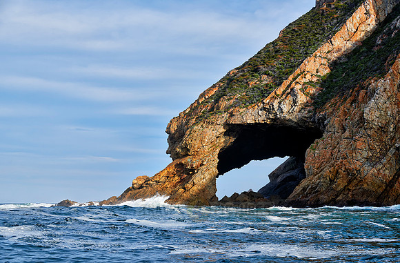 cliffs and cave at coastline