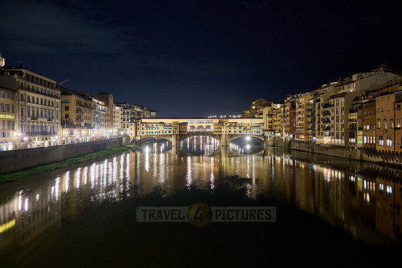 night shot of illuminated medieval brigde Ponte Vecchio