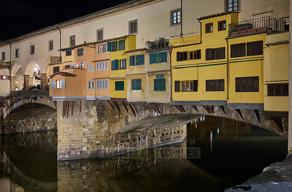 night shot of illuminated medieval brigde Ponte Vecchio