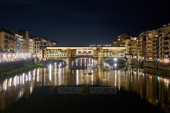 night shot of illuminated medieval brigde Ponte Vecchio