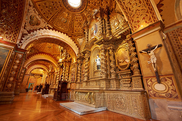 interior of golden designed Compania de jesus church