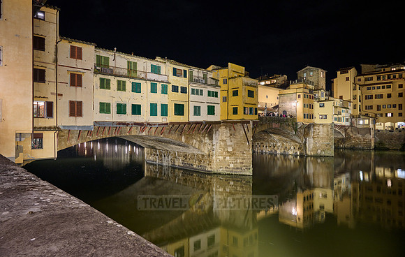 night shot of illuminated medieval brigde Ponte Vecchio