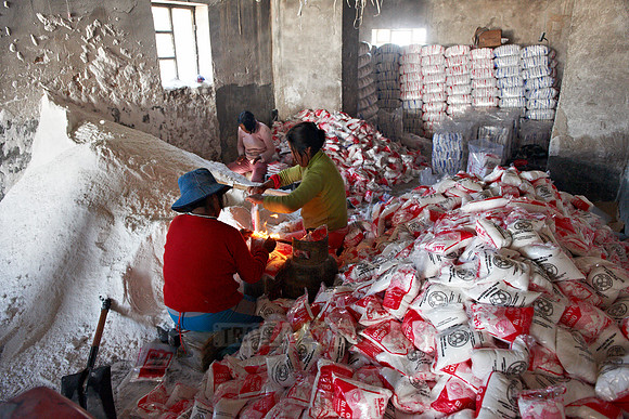worker preparing salt