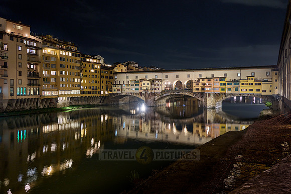 night shot of illuminated medieval brigde Ponte Vecchio