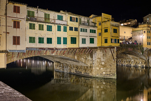 night shot of illuminated medieval brigde Ponte Vecchio
