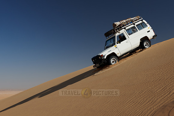 4x4 offroad car in desert landscape