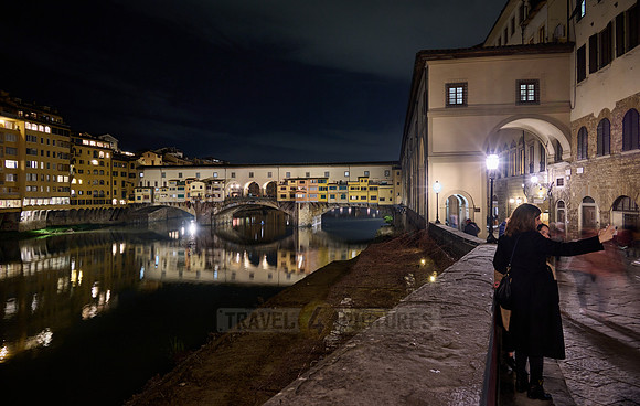 night shot of illuminated medieval brigde Ponte Vecchio
