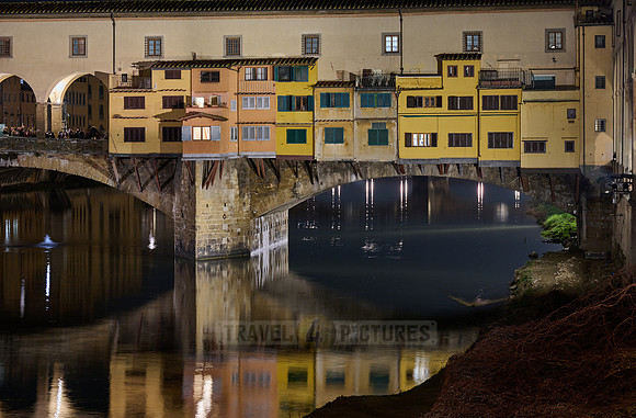 night shot of illuminated medieval brigde Ponte Vecchio