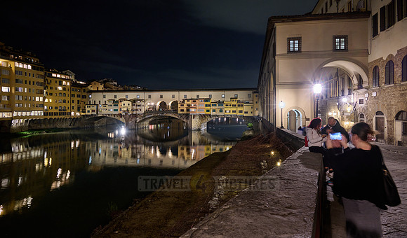 night shot of illuminated medieval brigde Ponte Vecchio