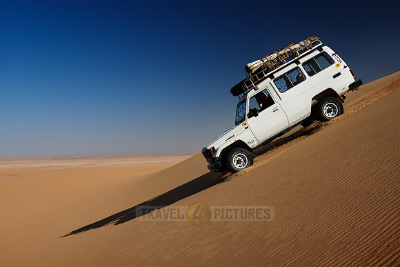 4x4 offroad car in desert landscape