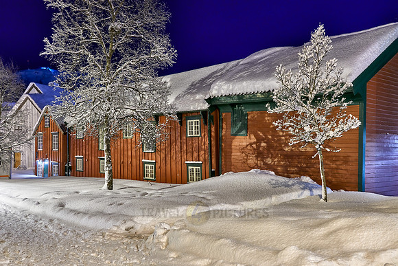 typical wooden buildings in harbor of Tromsø