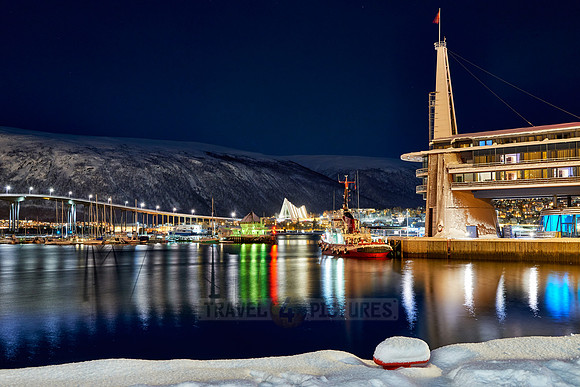 snow covered landscape of harbor in Tromso