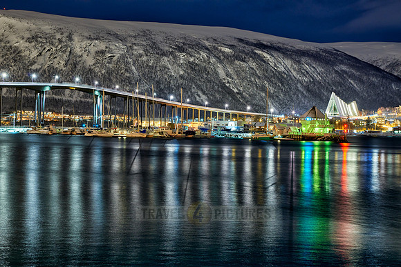 snow covered landscape of harbor in Tromso