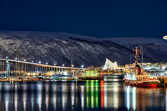 snow covered landscape of harbor in Tromso