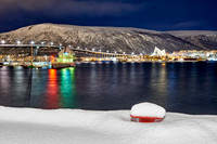 snow covered landscape of harbor in Tromso