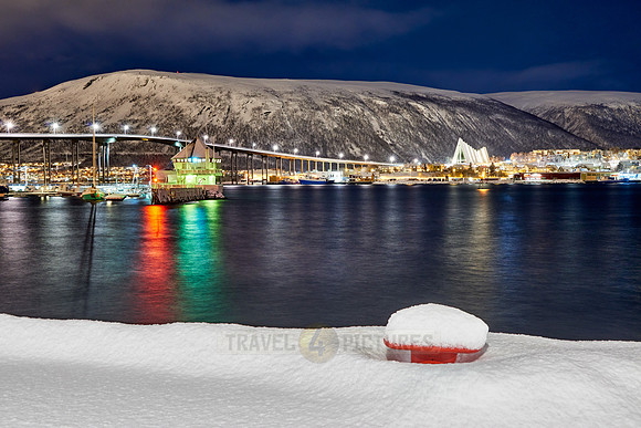 snow covered landscape of harbor in Tromso