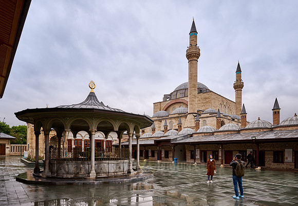 outside view of museum of Mevlana Rumi with Selimiye Mosque behind