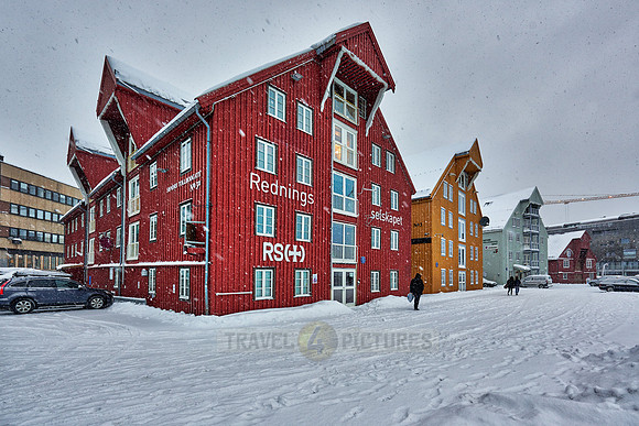 typical wooden buildings in harbour of Tromsø