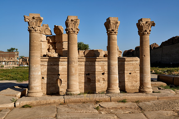 roman columns in front of temple complex