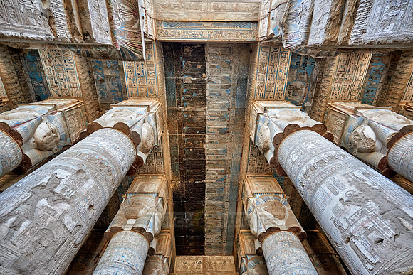 magnificent ceiling with colored stone carving in columns hall