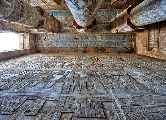 magnificent ceiling with colored stone carving in columns hall