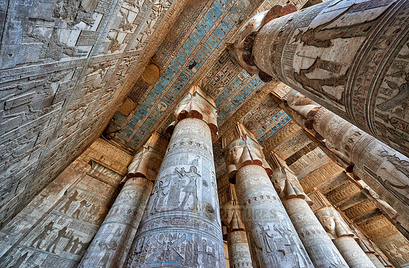 magnificent ceiling with colored stone carving in columns hall