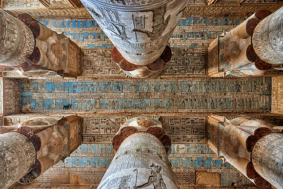 magnificent ceiling with colored stone carving in columns hall