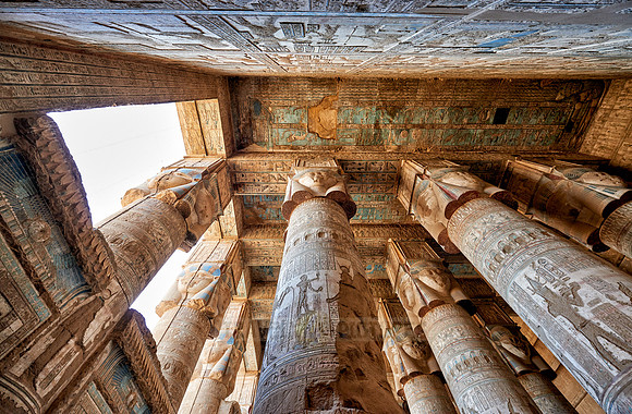 magnificent ceiling with colored stone carving in columns hall