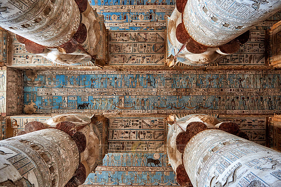 magnificent ceiling with colored stone carving in columns hall