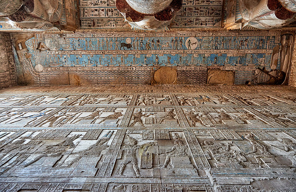 magnificent ceiling with colored stone carving in columns hall