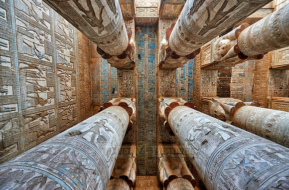magnificent ceiling with colored stone carving in columns hall