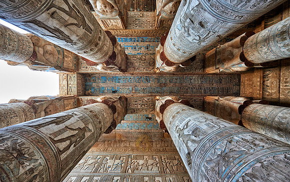 magnificent ceiling with colored stone carving in columns hall