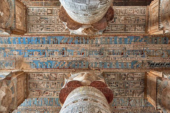 magnificent ceiling with colored stone carving in columns hall