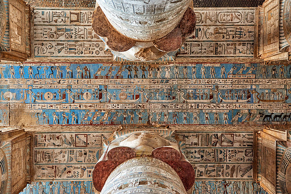 magnificent ceiling with colored stone carving in columns hall