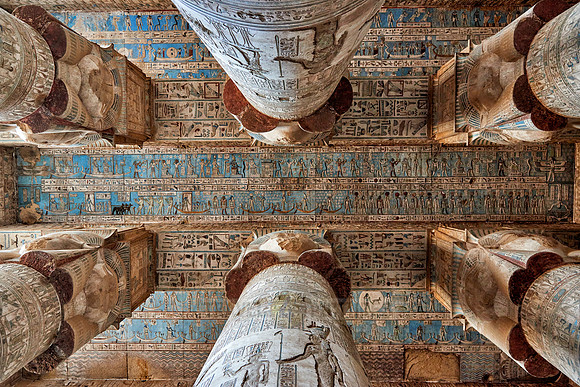 magnificent ceiling with colored stone carving in columns hall