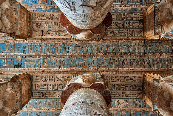 magnificent ceiling with colored stone carving in columns hall