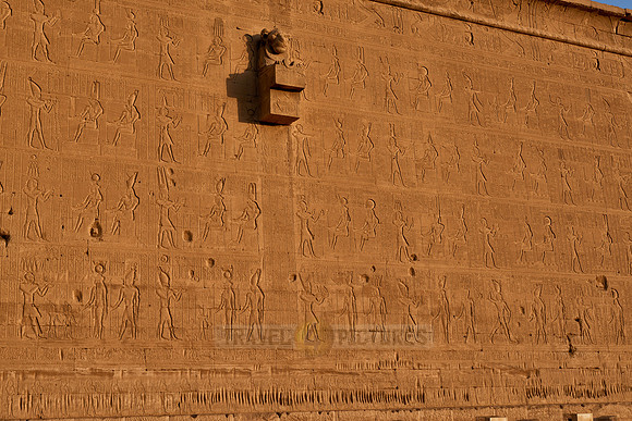 Lion gargoyle outside wall of Hathor temple,