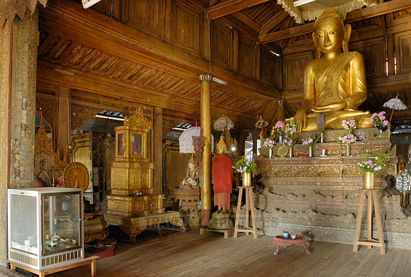 main golden Buddha statue inside Shwe Yaungwe monastery