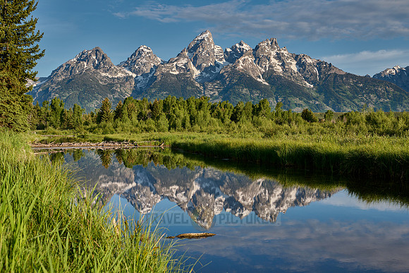 Grand Teton Range with reflection in river at Schwabacher Landing