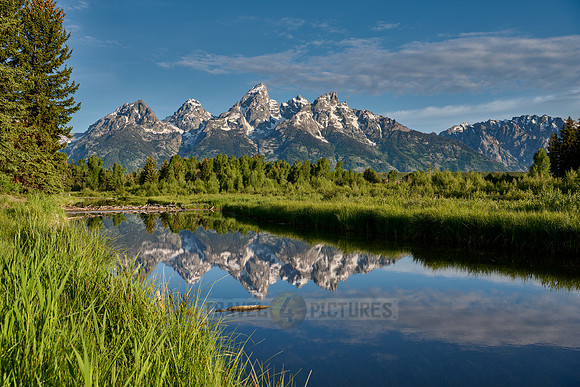 Grand Teton Range with reflection in river at Schwabacher Landing