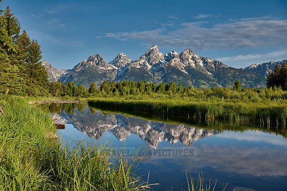 Grand Teton Range with reflection in river at Schwabacher Landing