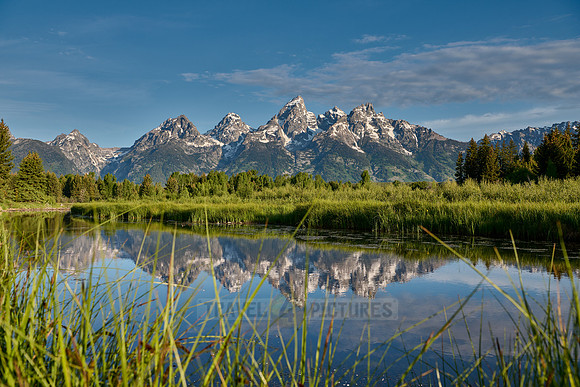 Grand Teton Range with reflection in river at Schwabacher Landing