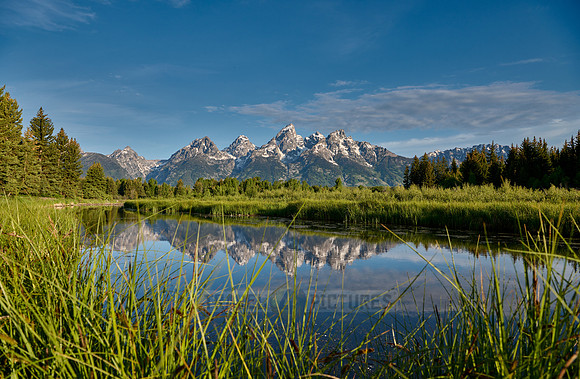 Grand Teton Range with reflection in river at Schwabacher Landing