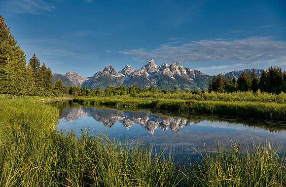 Grand Teton Range with reflection in river at Schwabacher Landing