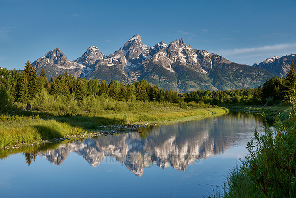 Grand Teton Range with reflection in river at Schwabacher Landing