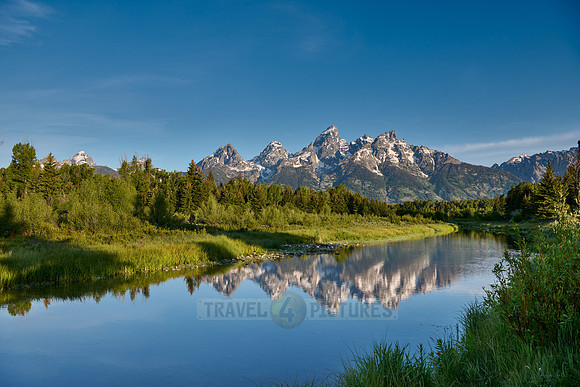 Grand Teton Range with reflection in river at Schwabacher Landing